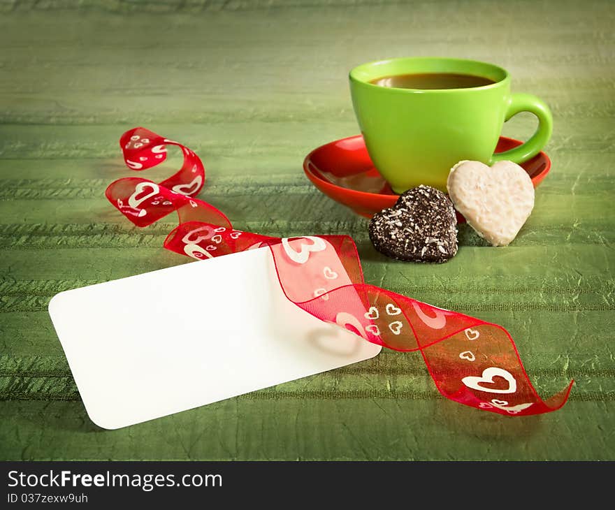 Green background with cup of tea