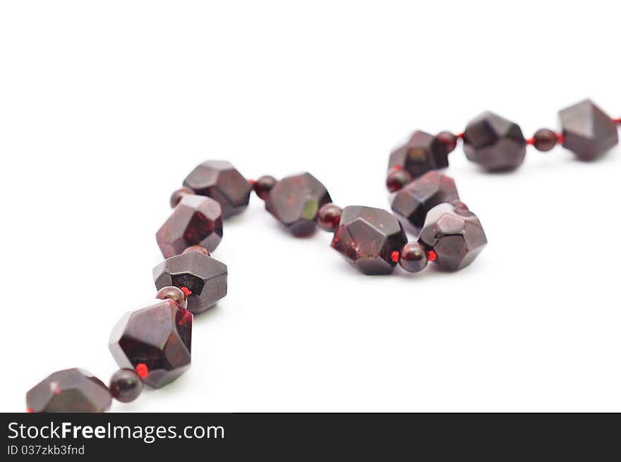 Garnet necklace isolated on a white background