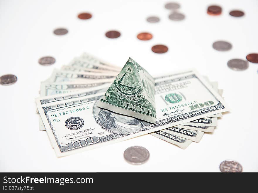 Dollar pyramid on white background macro