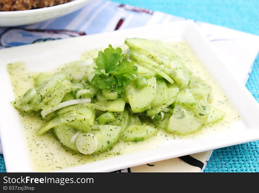 Salad of cucumber on a plate. Salad of cucumber on a plate