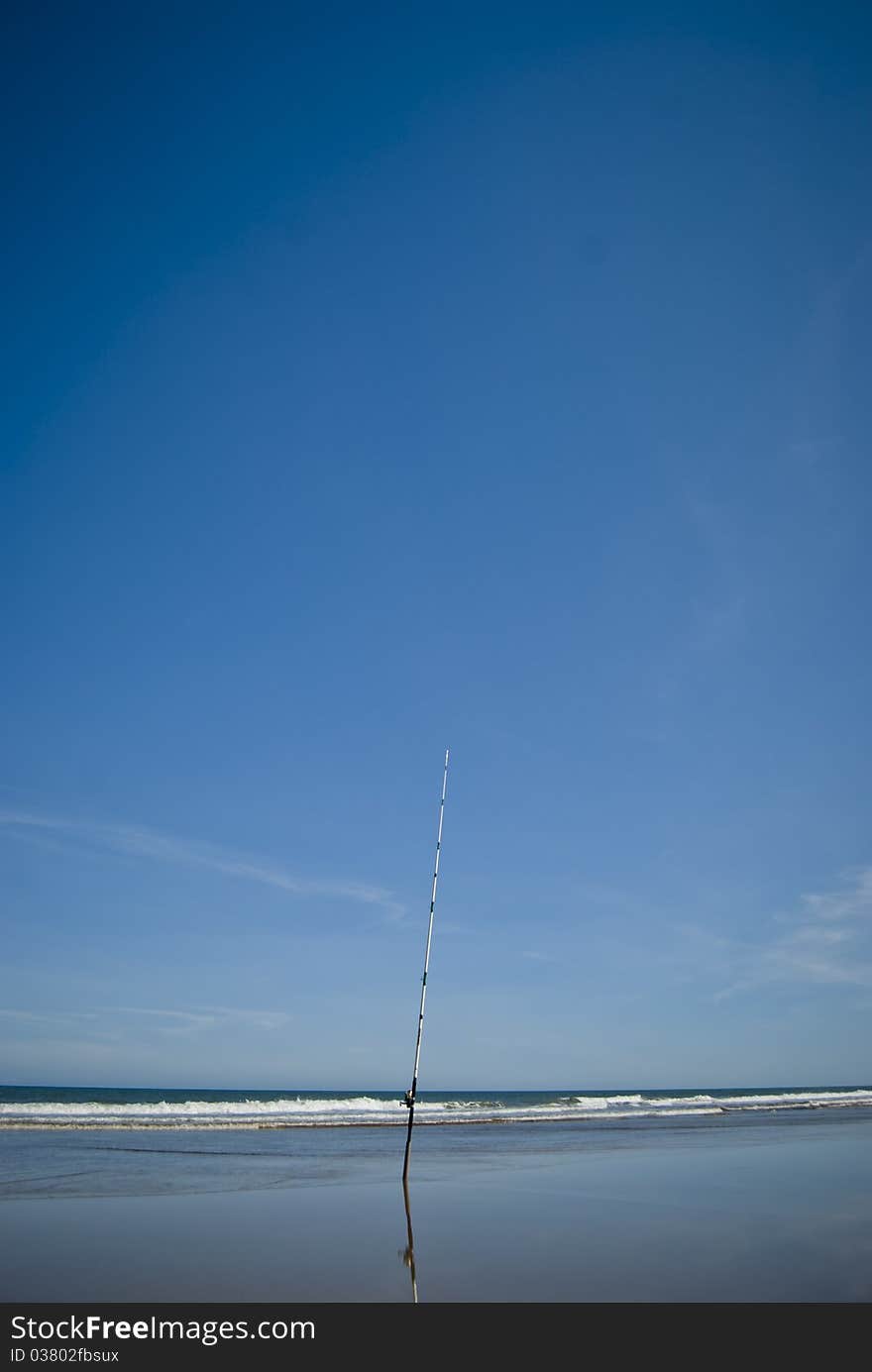 Fishing rod on the beach. Fishing rod on the beach