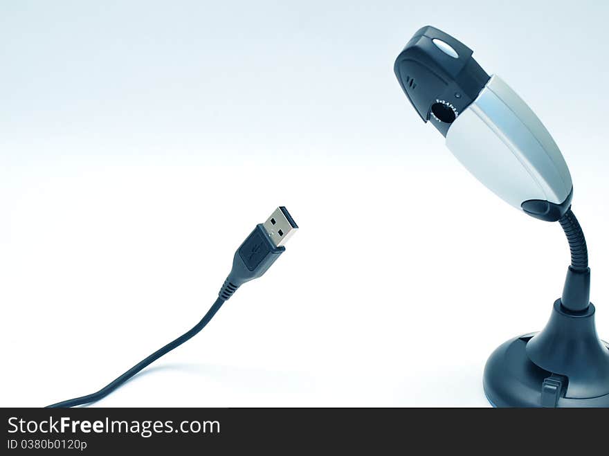 Close up of web cam and USB cable on white backgroud. Close up of web cam and USB cable on white backgroud