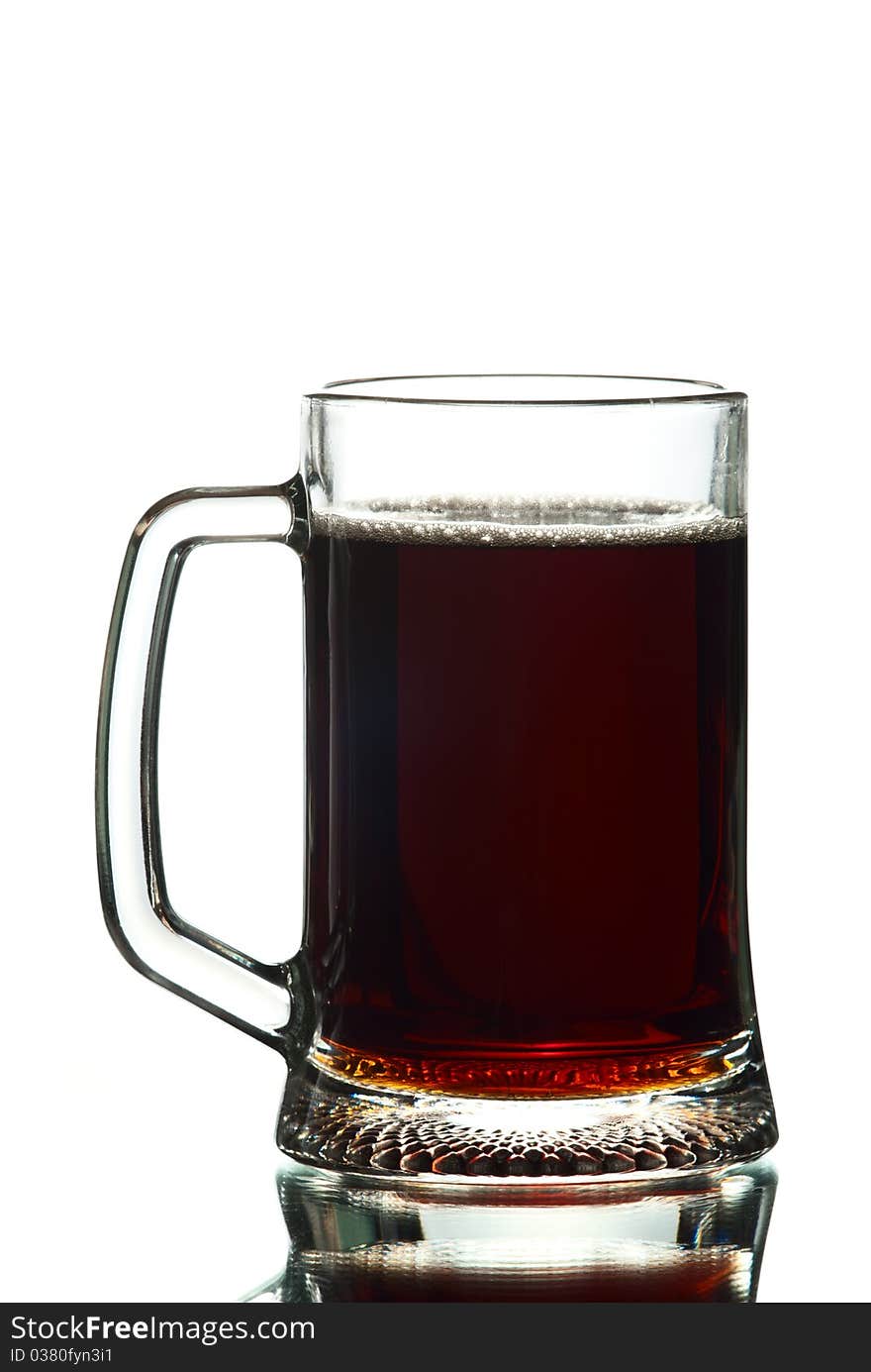 A glass of dark beer.