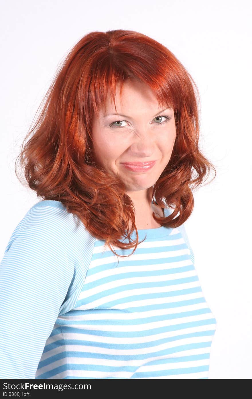 Portrait of beautiful young redheaded woman