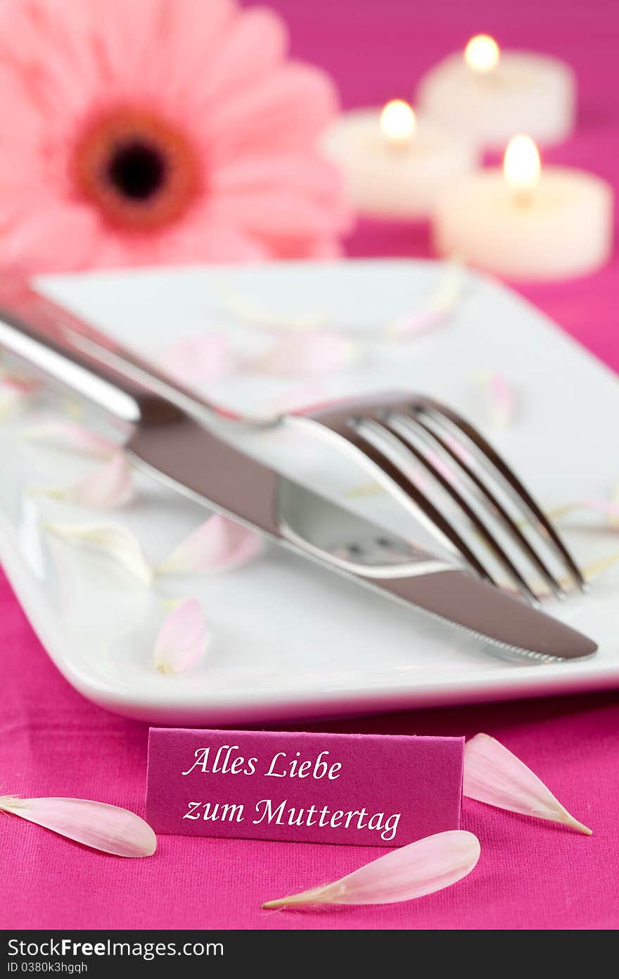 Place setting with candles for mothers day. Place setting with candles for mothers day