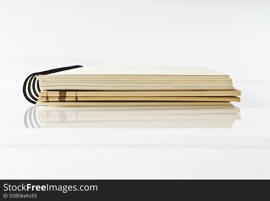 Isolated notebook on white background with shadow