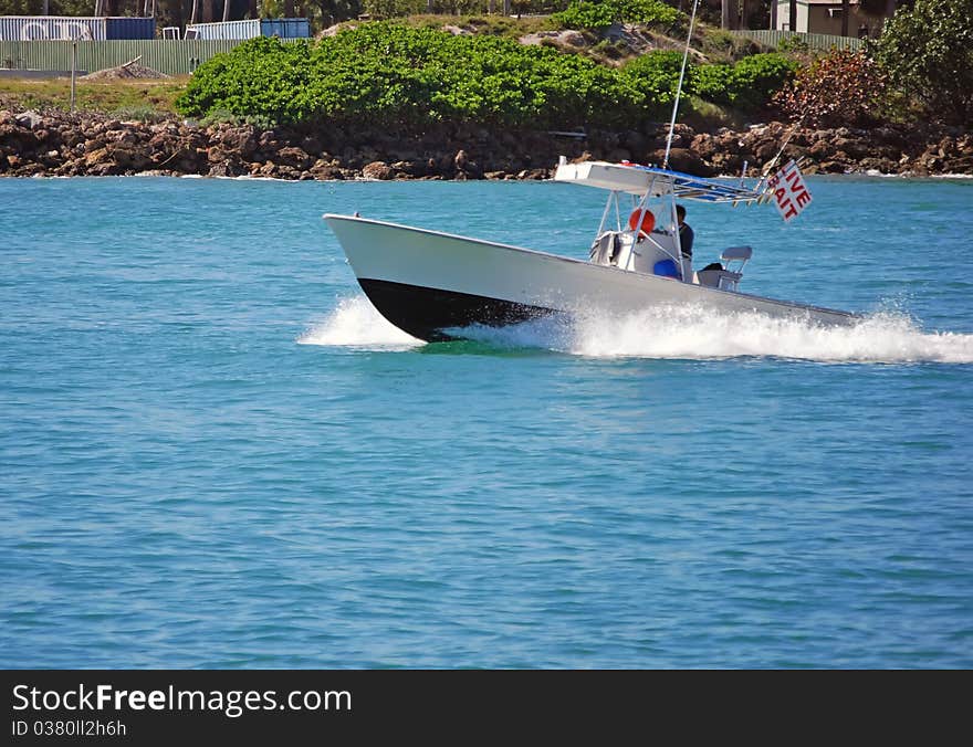 Small fishing boat selling live bait on the florida intercoastal waterway near miami beach