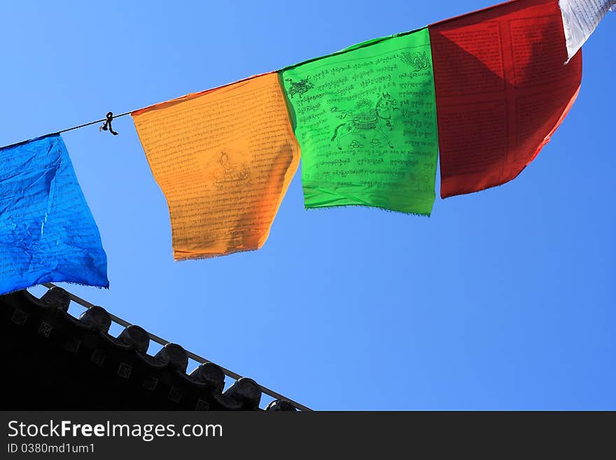 Prayer flags on blue sky background