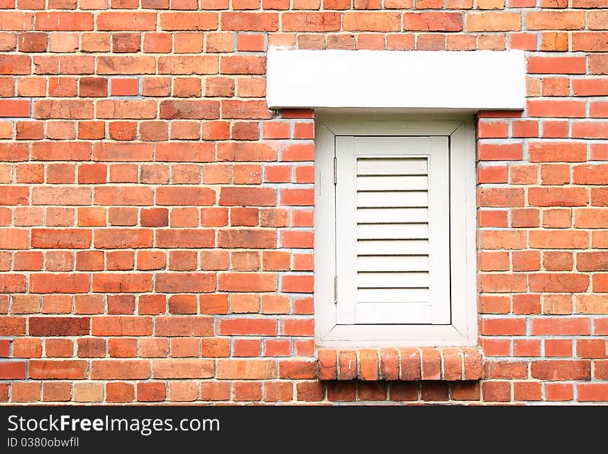 Old Orange Brick Wall with White Window. Old Orange Brick Wall with White Window