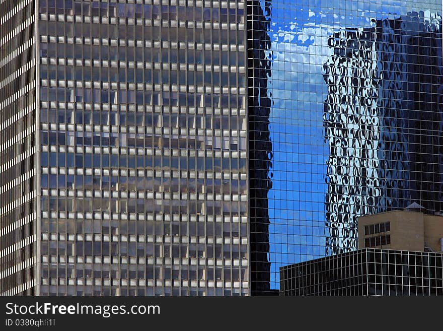 Manhattan New York City modern building reflection in the glass facade of the house.