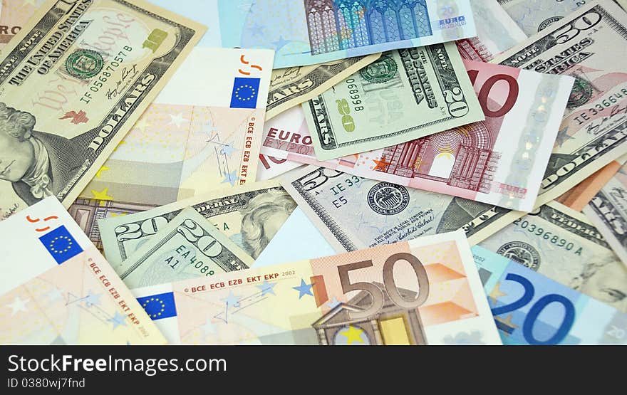 Background made from euro and dollar banknotes. Background made from euro and dollar banknotes