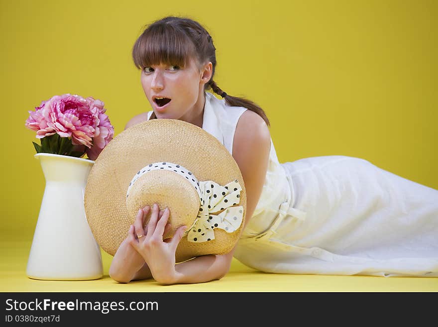 Surprised woman with hat