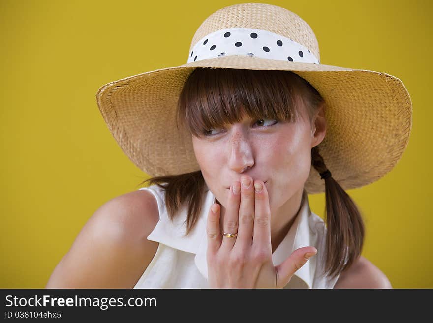 Portrait of innocent woman covering her mouth with hand. Portrait of innocent woman covering her mouth with hand