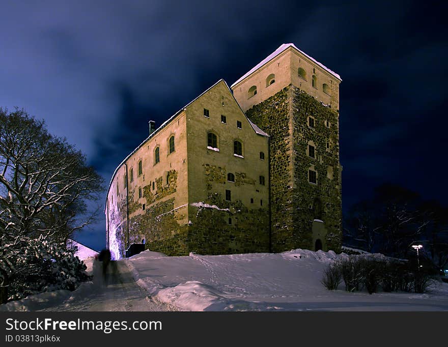 Gloomy castle in Turku at night