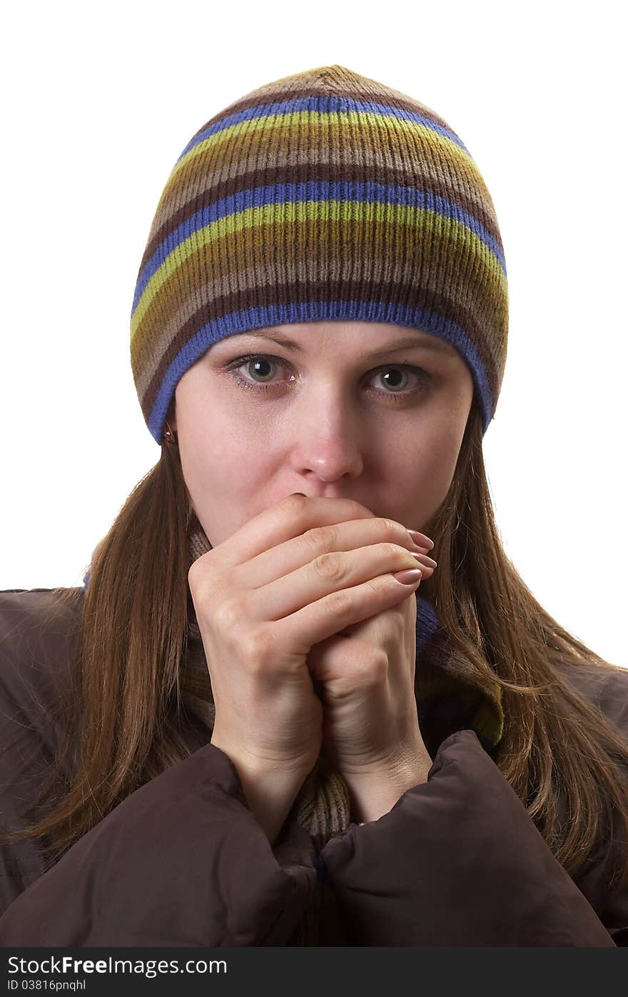 Young woman in winter clothes isolated over white background. Young woman in winter clothes isolated over white background