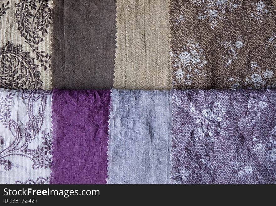 Many kind of fabric in violet and brown shade. Many kind of fabric in violet and brown shade.