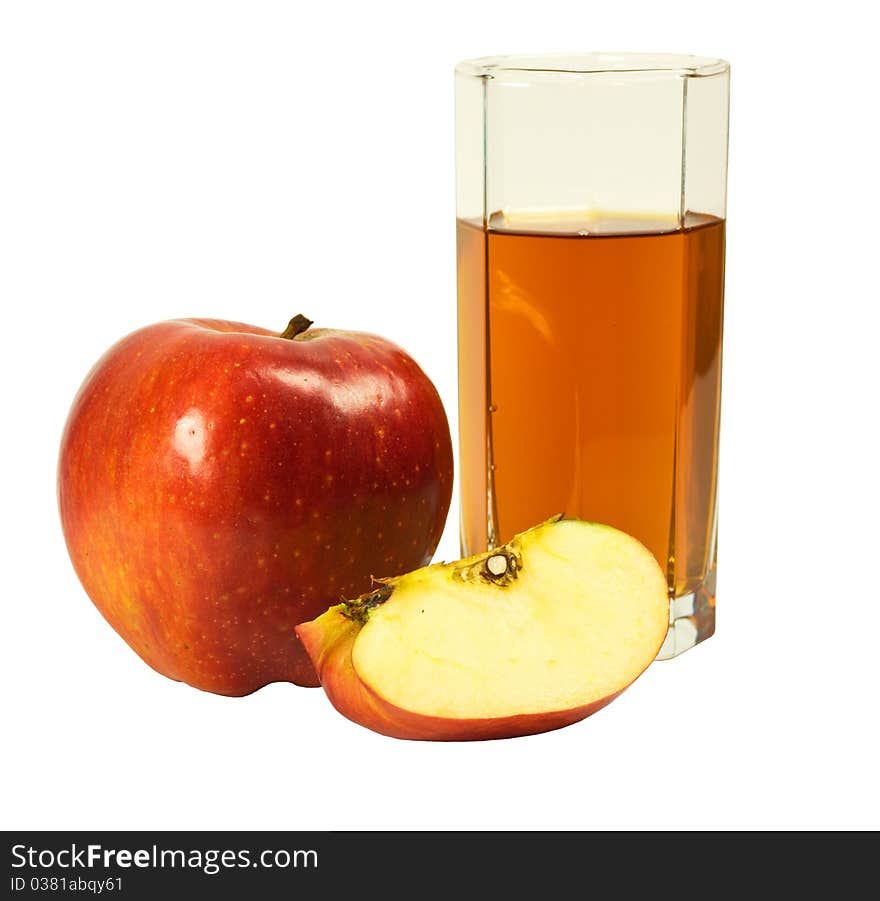 Whole, and slice an apple and a glass of juice isolated on a white background. Whole, and slice an apple and a glass of juice isolated on a white background.