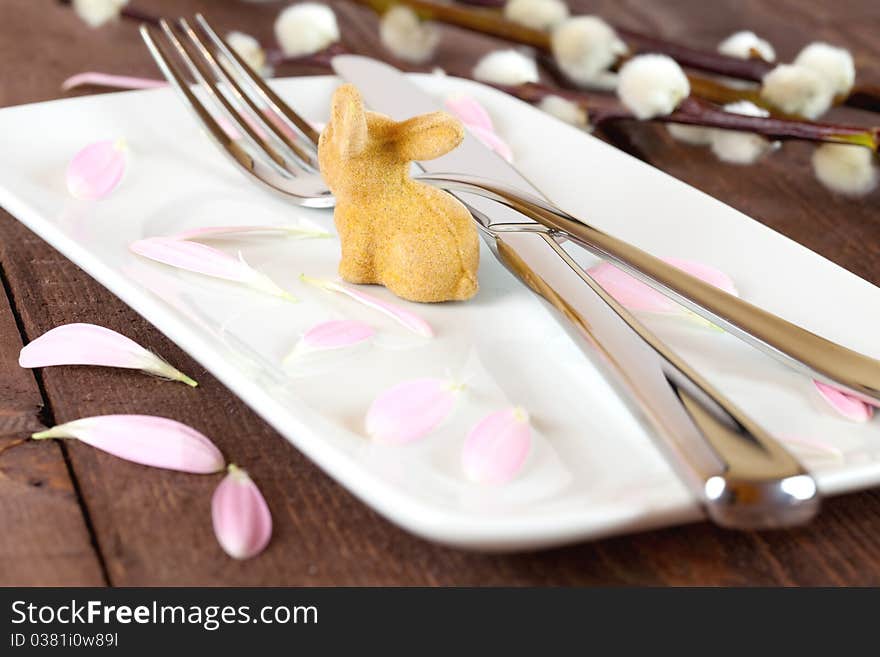 Easter place setting with petals and willow