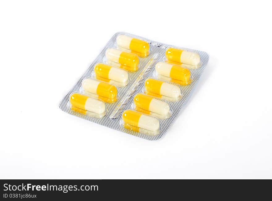 Capsules of medicine in blister isolated. Capsules of medicine in blister isolated.