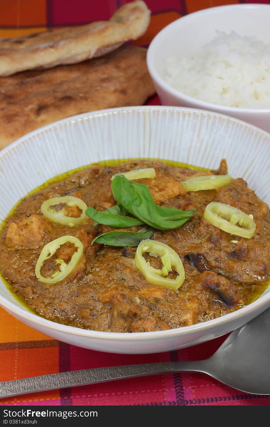 Chicken and sweet potato curry with rice and naan