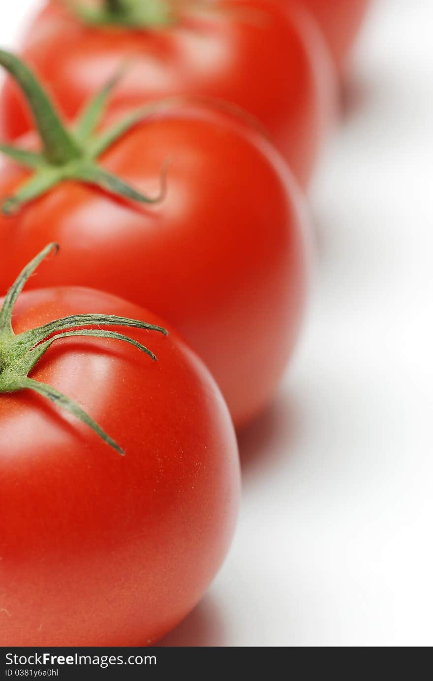 Isolated fresh tomatoes