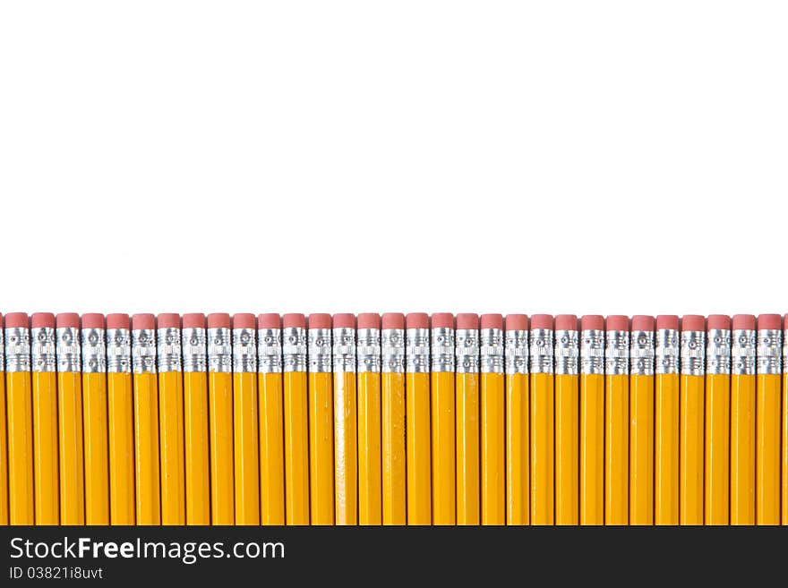 A row of pencils isolated on white