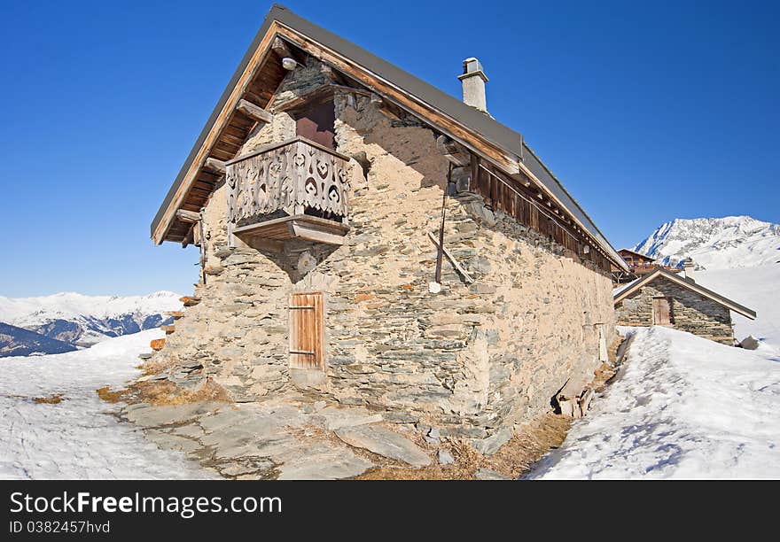 Traditional alpine hut on a mountain