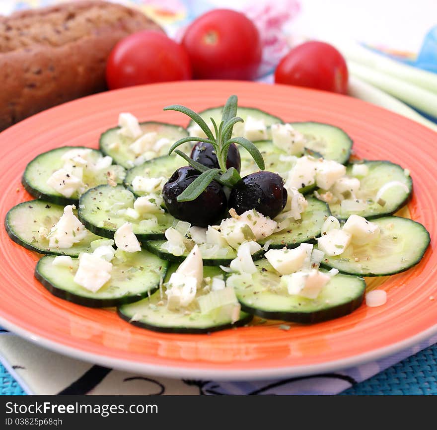 Salad of cucumber on a plate. Salad of cucumber on a plate