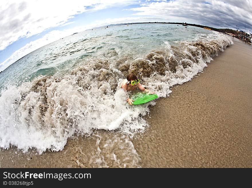 Boy has fun at the beach