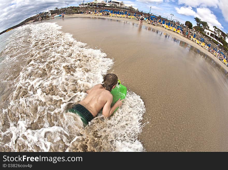 Boy has fun at the beach