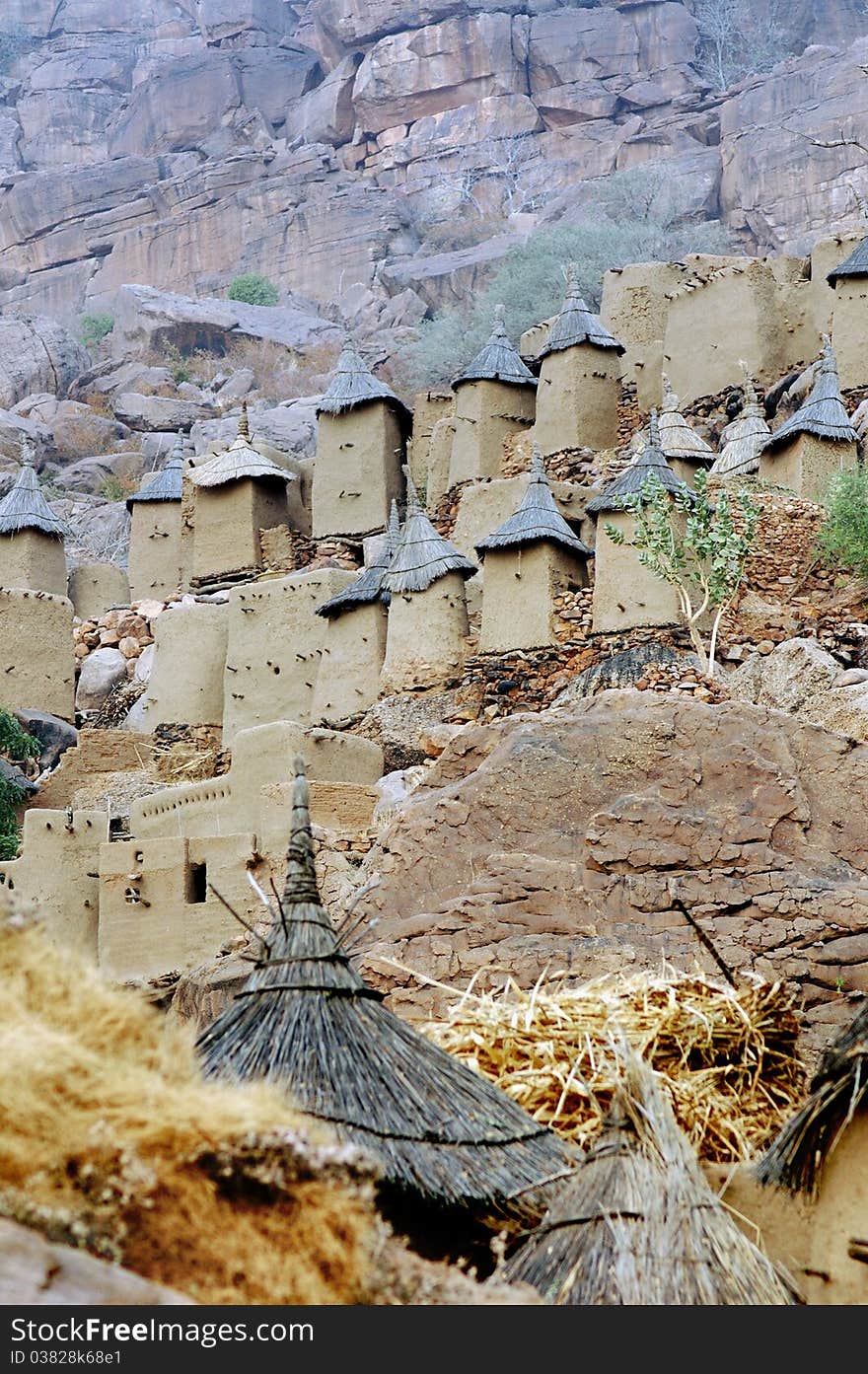 Dogon granaries in a village along the base of the Bandiagara escarpment. Dogon granaries in a village along the base of the Bandiagara escarpment