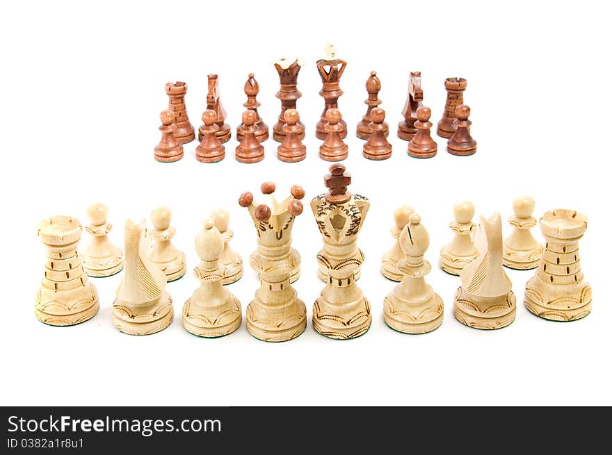 Chess figures against each other, on white background