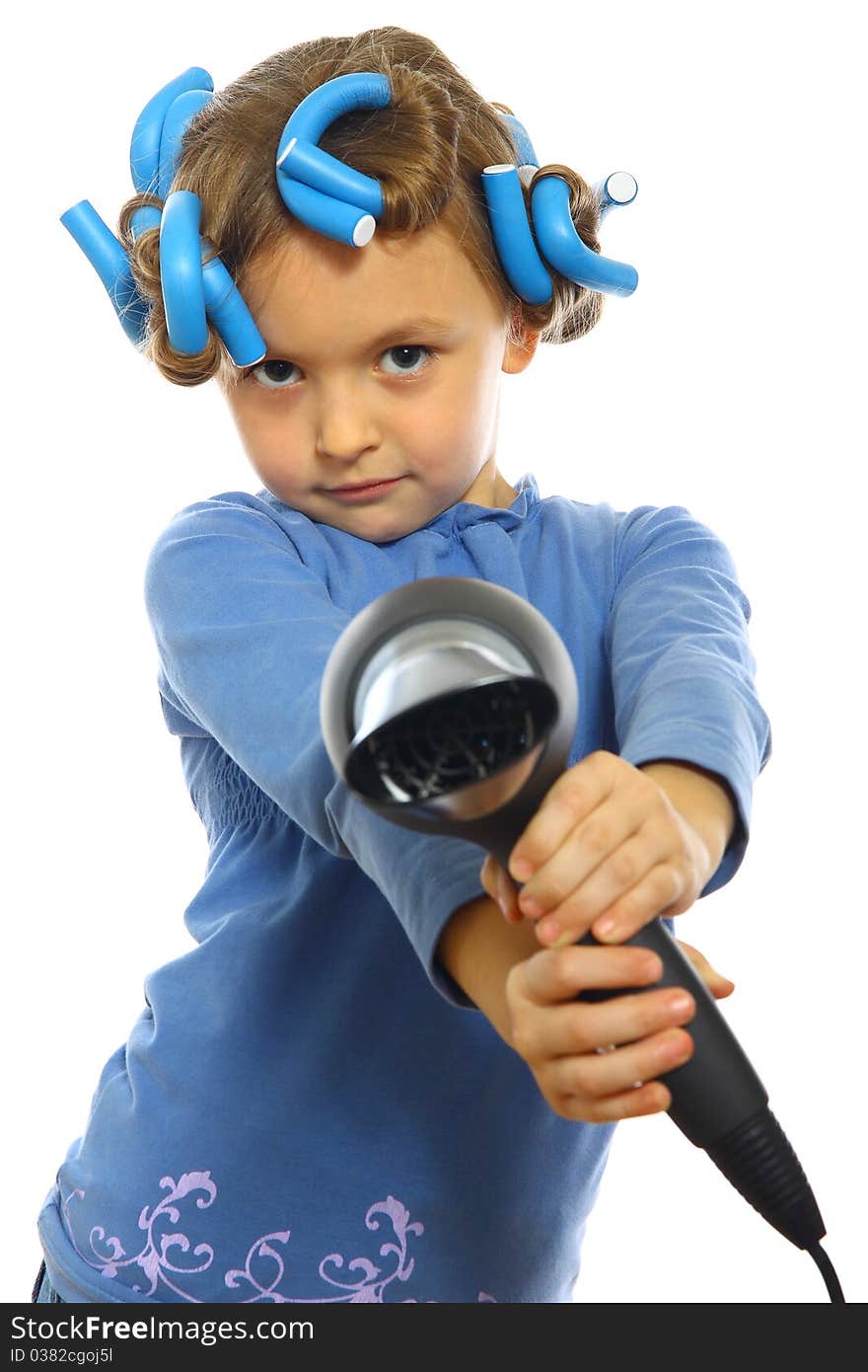 Little girl posing with hair dryer isolated on white