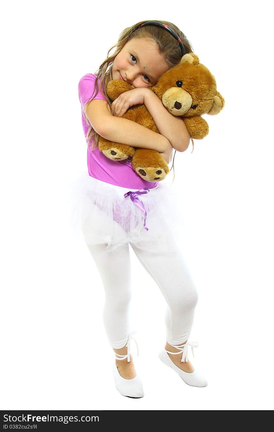 Little girls posing after training with his teddy bear. Little girls posing after training with his teddy bear