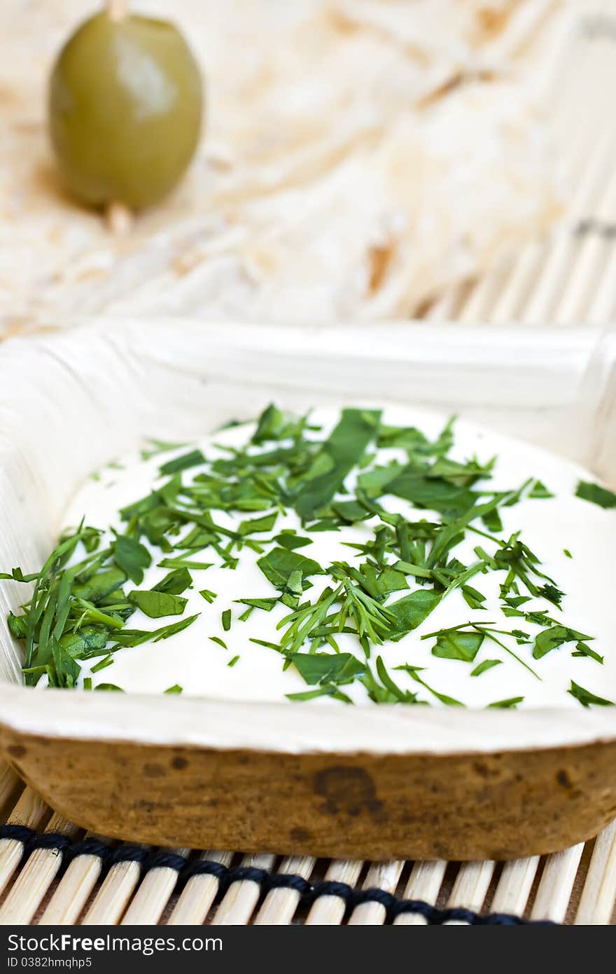 Wheat bread with olive and dip. Wheat bread with olive and dip.