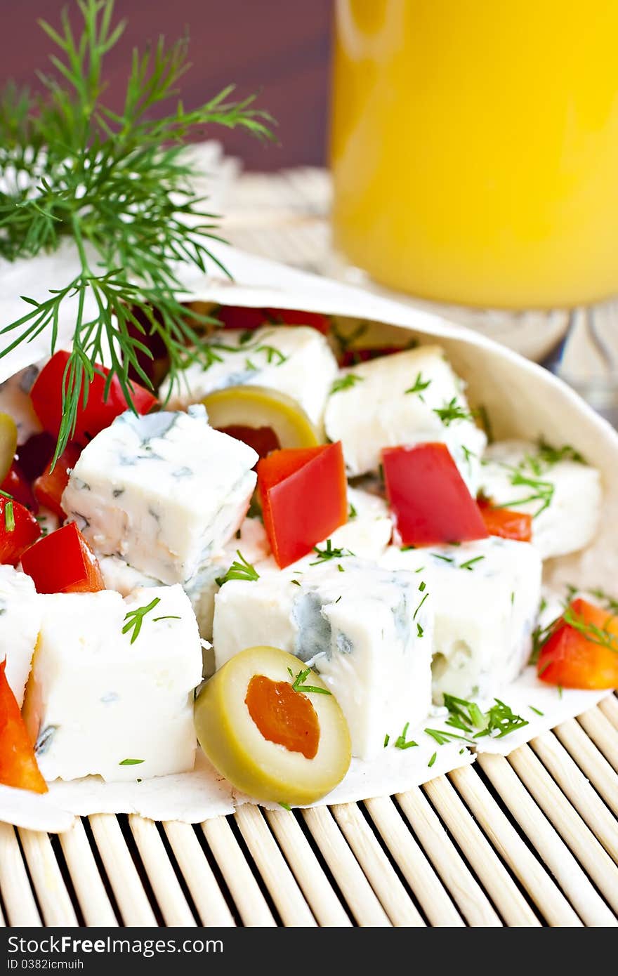 Lavash with a cheese filling and a glass of juice. Lavash with a cheese filling and a glass of juice.