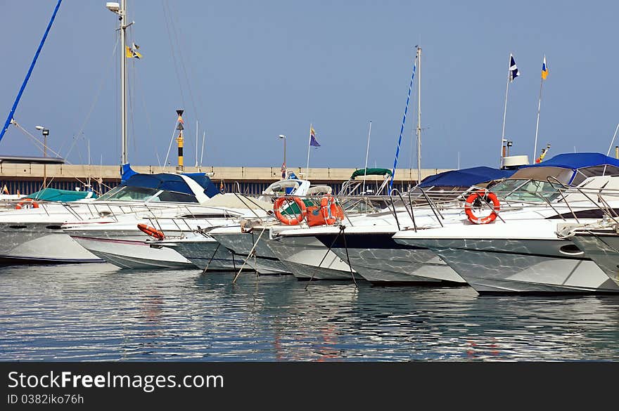 Yachts in harbor.