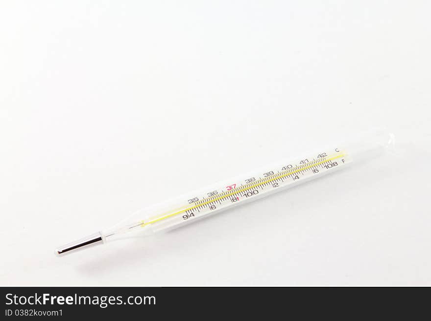 Clinical thermometer with shallow depth of field on white