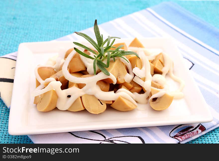 A fresh salad of mushrooms on a plate