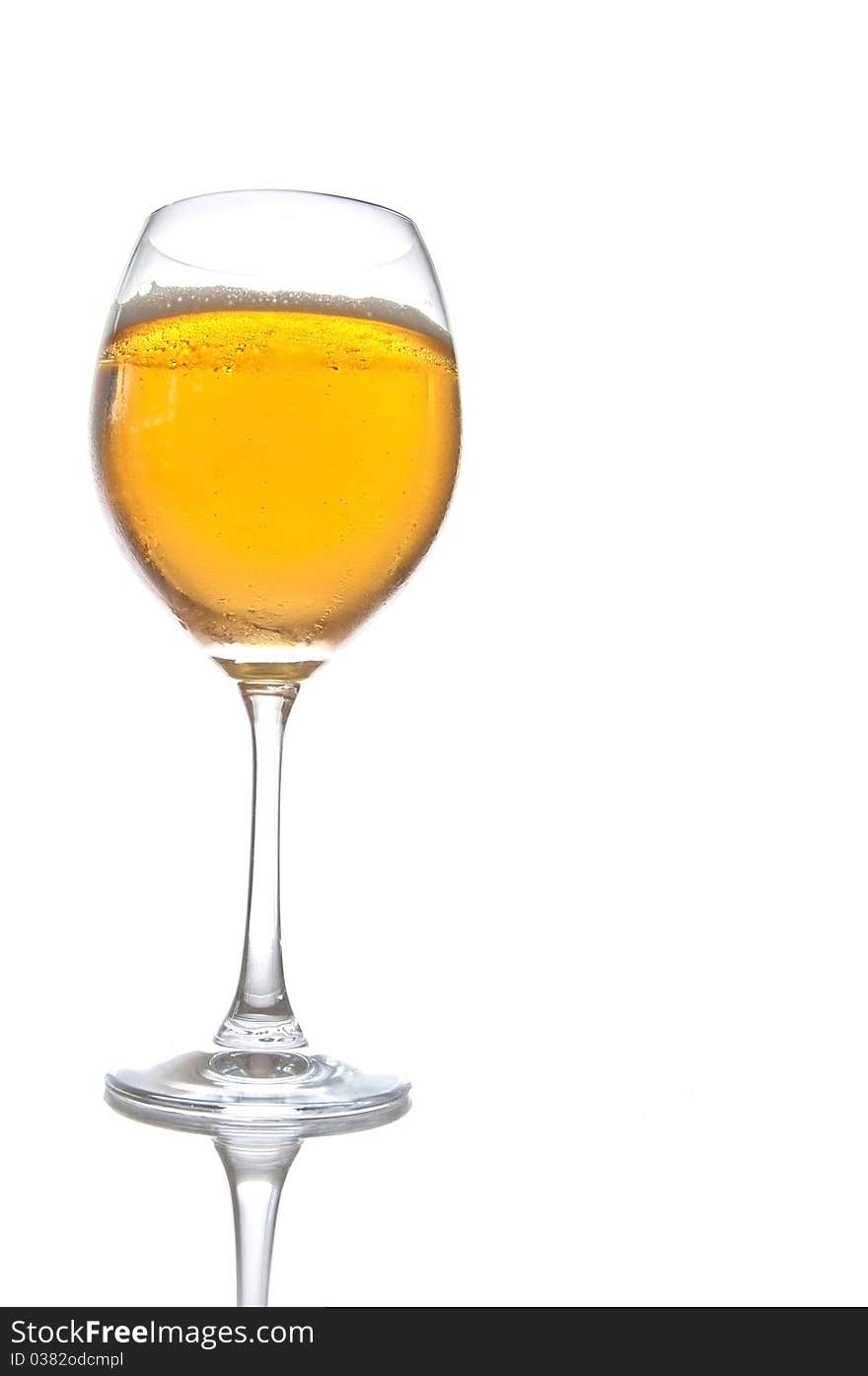 Beer on glass as white isolate background