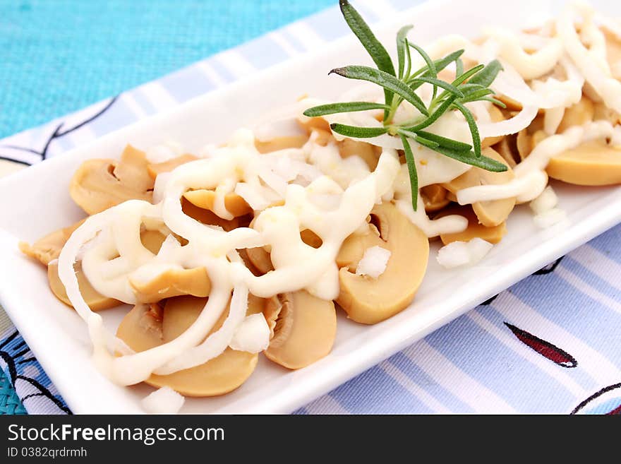 A fresh salad of mushrooms on a plate