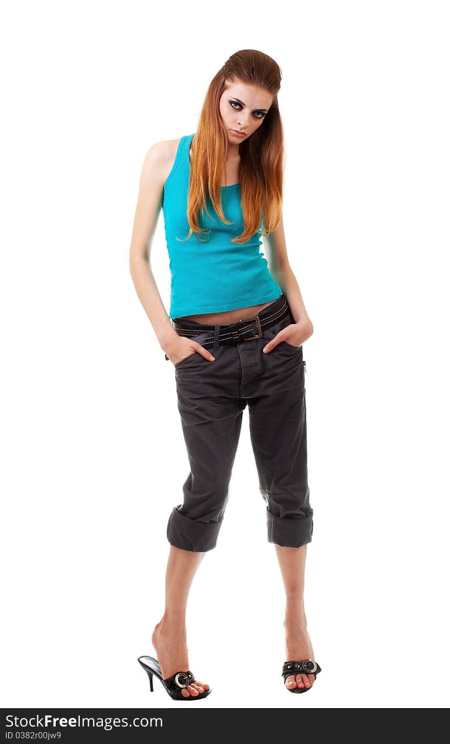 Girl in blue T-shirt on white background. Girl in blue T-shirt on white background