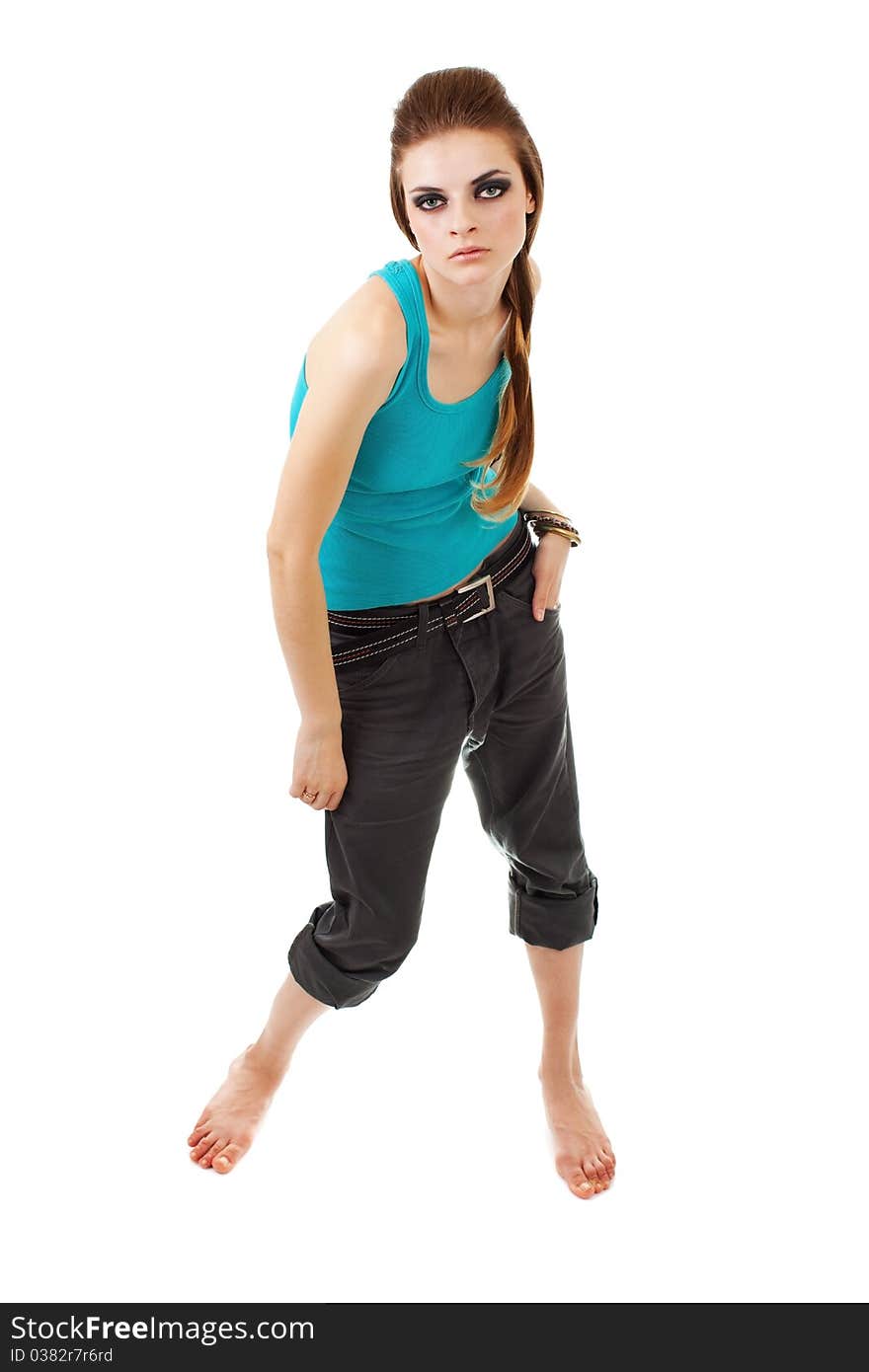 Girl in a dark makeup in blue T-shirt on white background