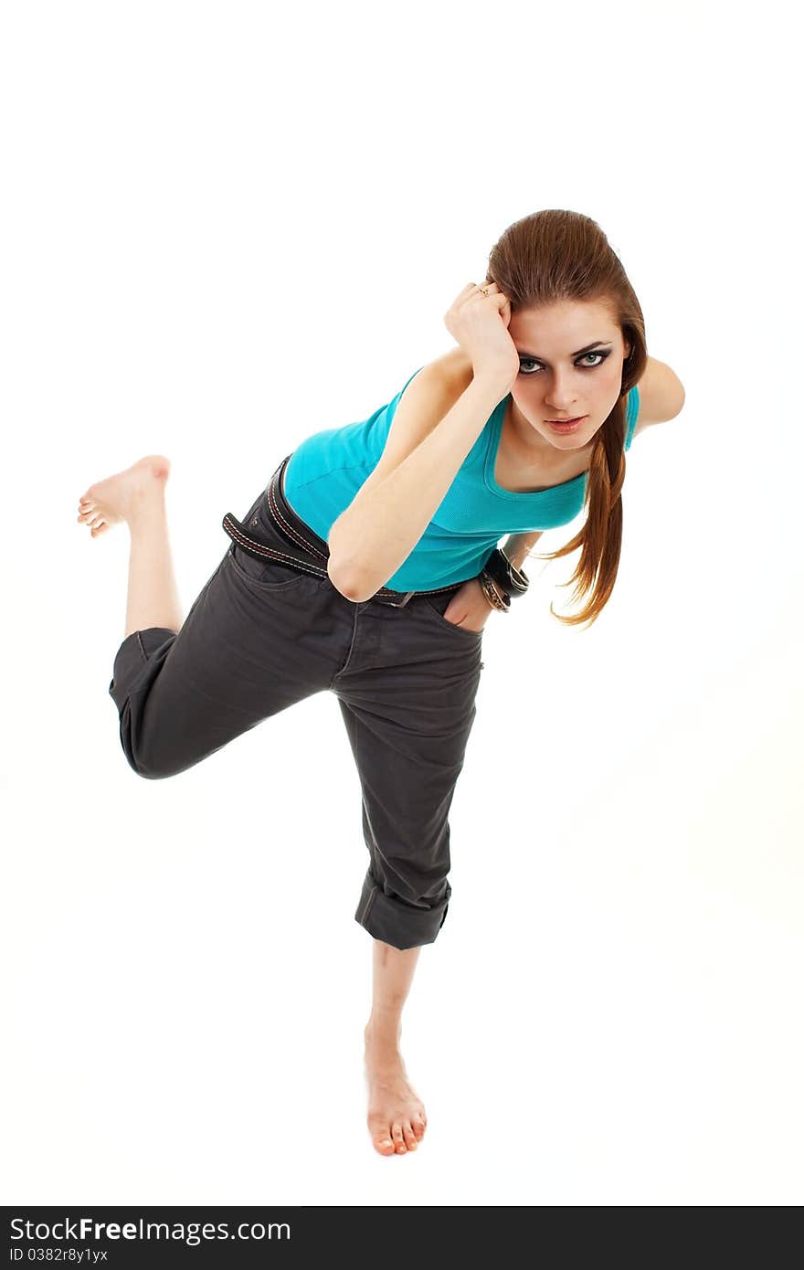 Girl in a dark makeup in blue T-shirt on white background