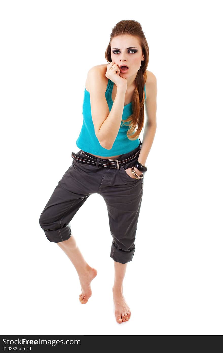 Girl in a dark makeup in blue T-shirt on white background with expression