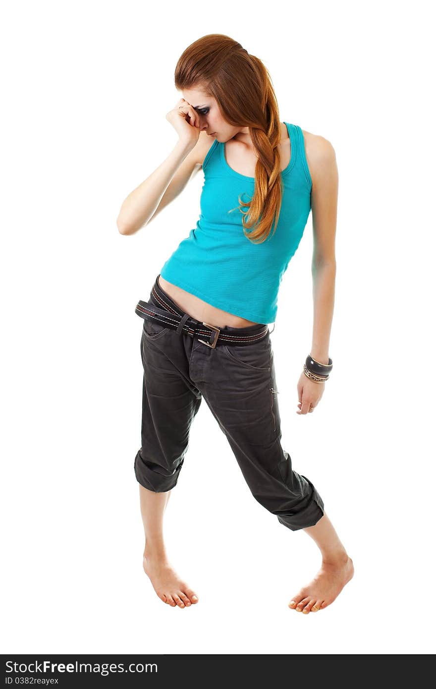 Girl in a dark makeup in blue T-shirt on white background