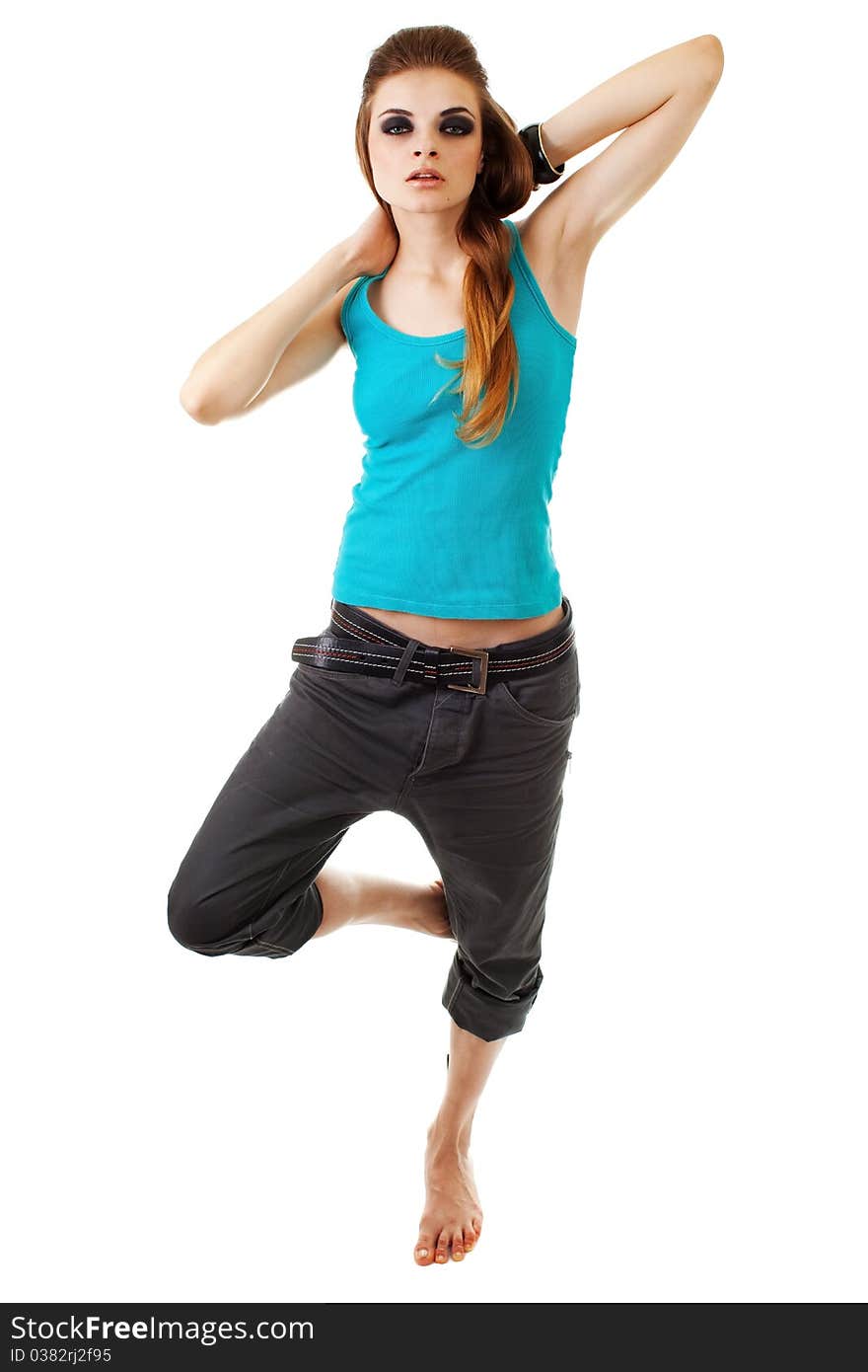 Girl in a dark makeup in blue T-shirt on white background