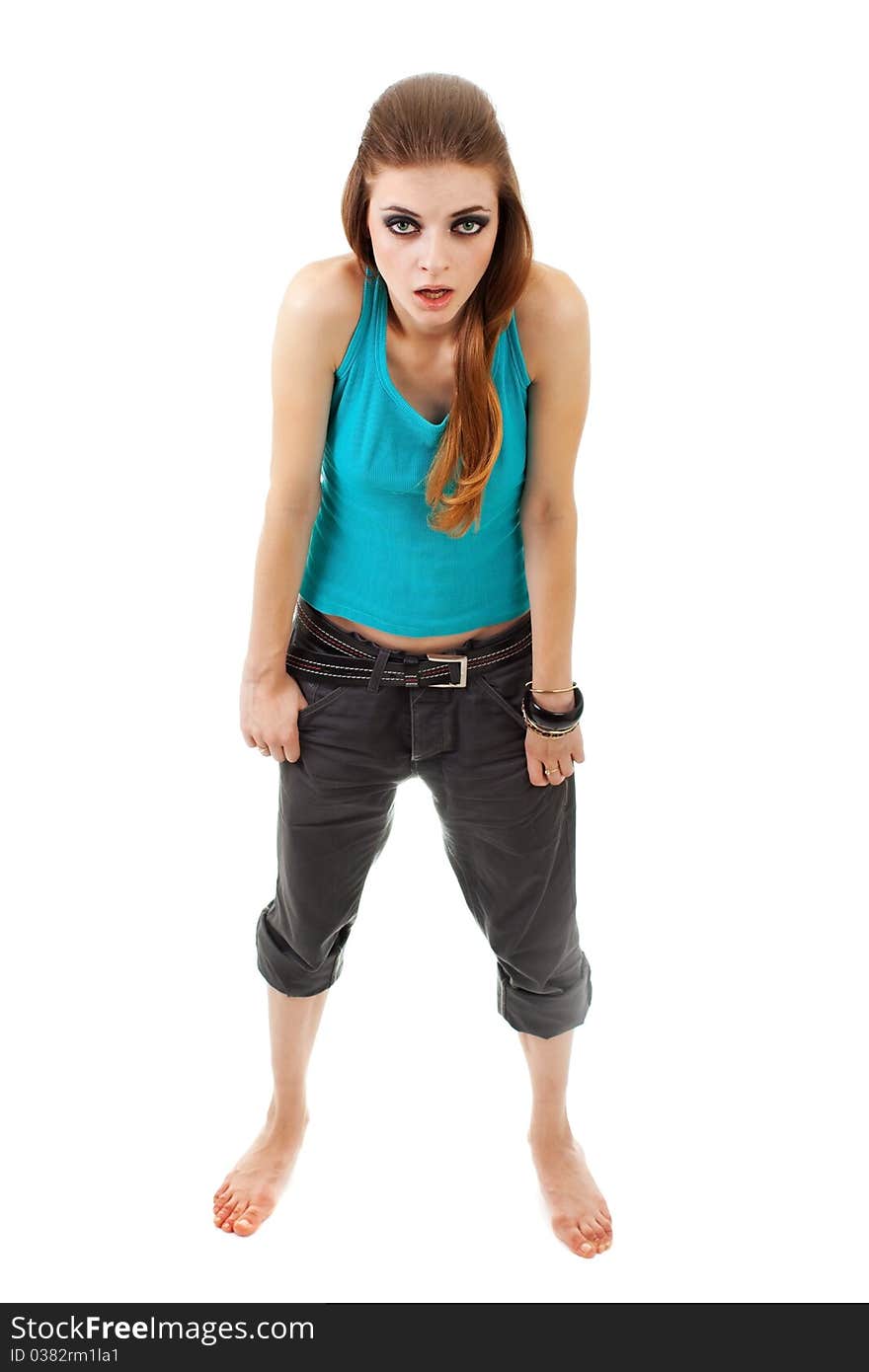 Girl in a dark makeup in blue T-shirt on white background