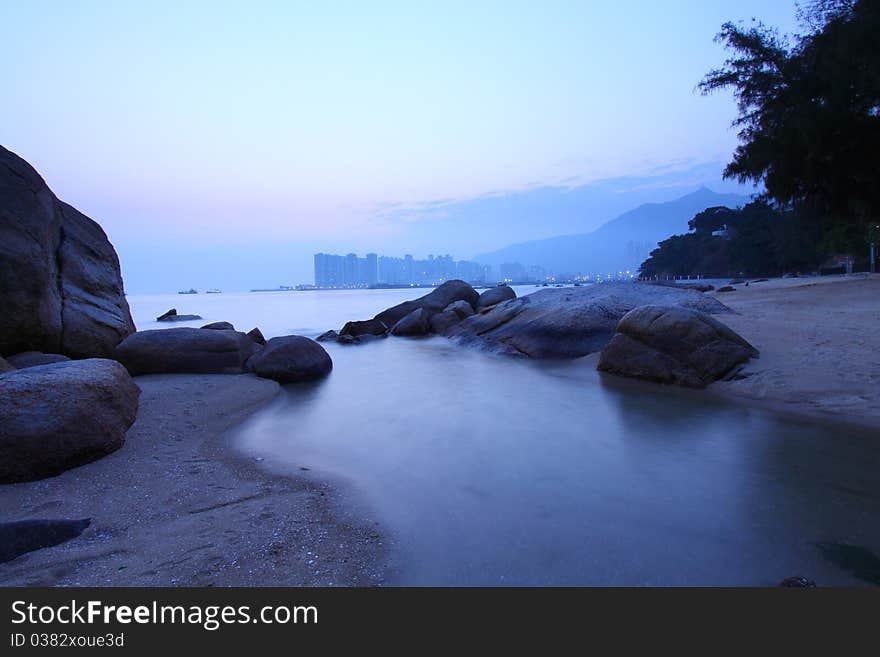 Sunset Under Long Exposure Along Seashore