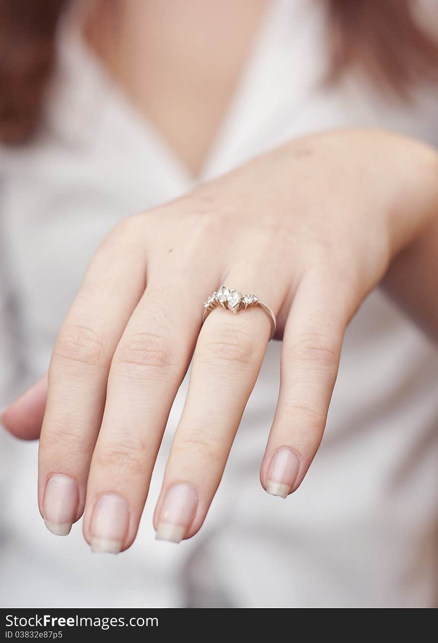 Engagement Ring Into A Finger